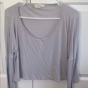 Light gray long sleeve crop top.